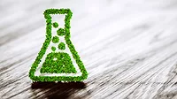 Green chemistry industry sign on black wooden background