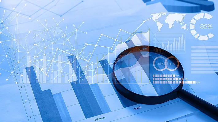 default market report Magnifying glass and documents with analytics data lying on tablet