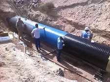 An image taken during application, where salt crust, the water table and intermediate soil layers are clearly visible.