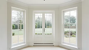 White bay windows and French doors