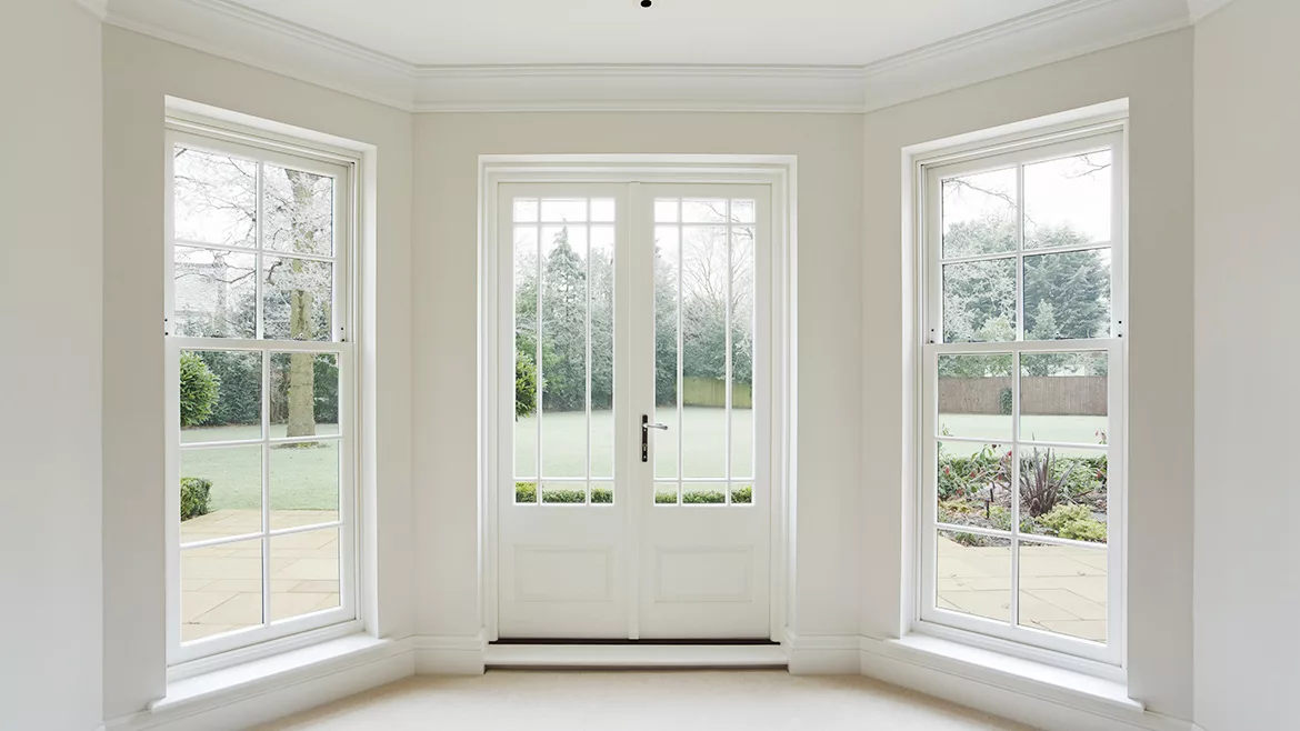 White bay windows and French doors