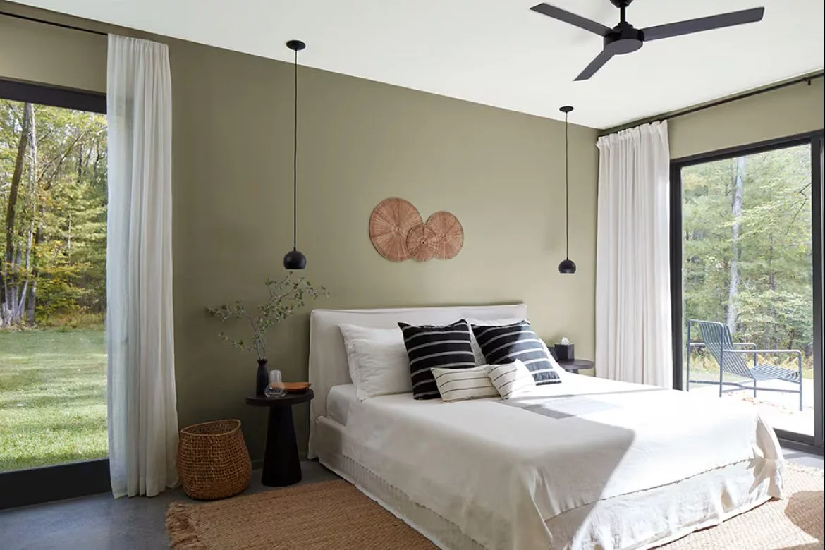 Sage green painted bedroom