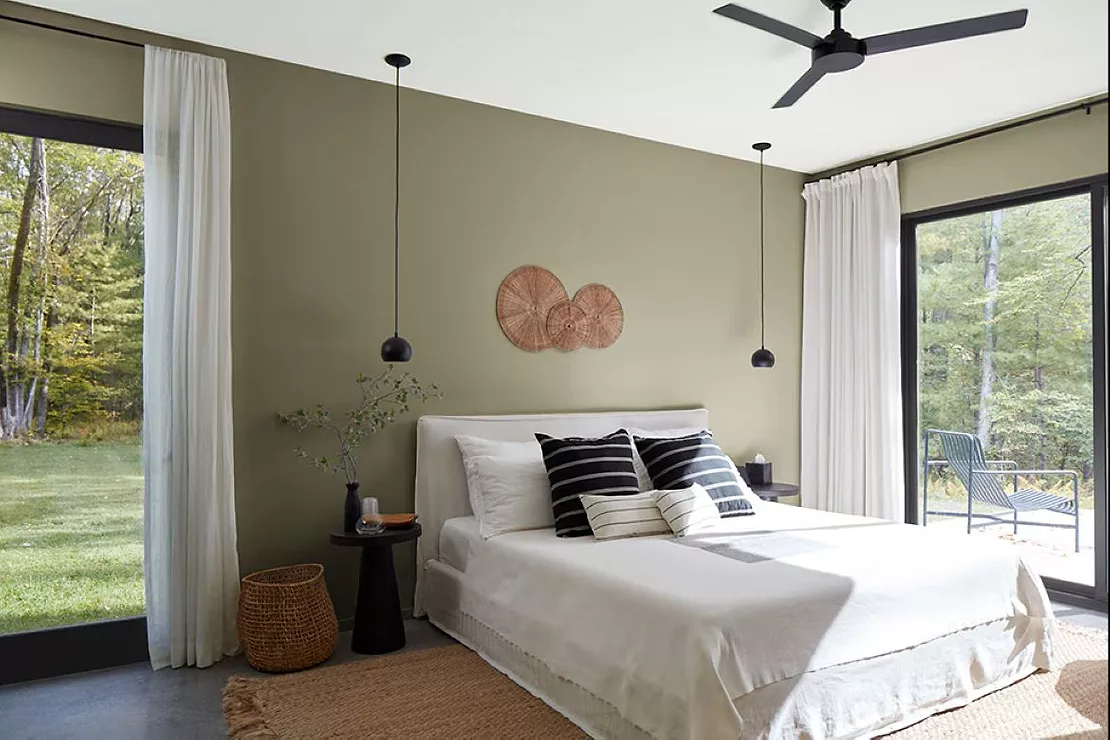 Sage green painted bedroom