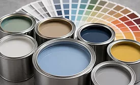 open paint cans with color swatches
