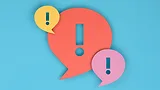 3d rendering of exclamation mark on speech bubble.