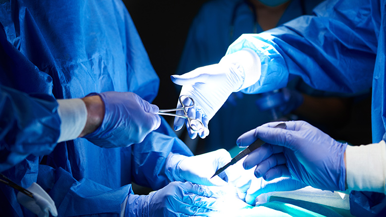 Surgeon getting ready to operate on a patient 
