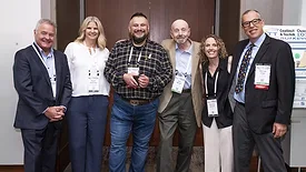 Group picture of Bill DeYoe, Kristin Johansson, Artur Palasz, Sam Morell, Courtney Bassett, and Michael Praw. 