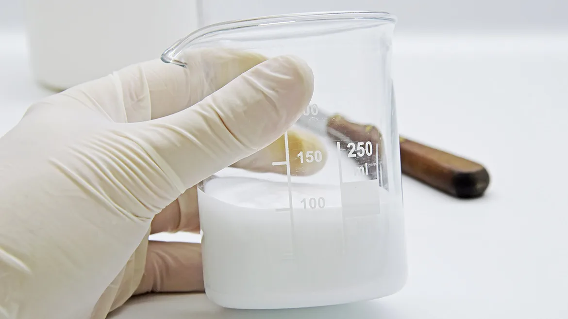 White resin in a beaker