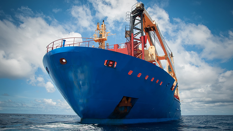 Close up of a blue vessel's view in the middle of the ocean