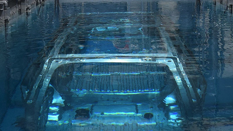 car being dunked for surface preparation