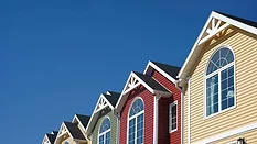 A newly constructed row of brightly coloured North American style town houses