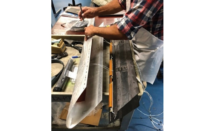 Installation of leading edge and thermal-mechanical expulsion de-icing system assembly.