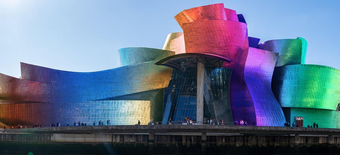 The Guggenheim Museum in Bilbao, Spain, with possible anodization colors for its titanium-clad facade. (Image credit: David Vives on Unsplash)