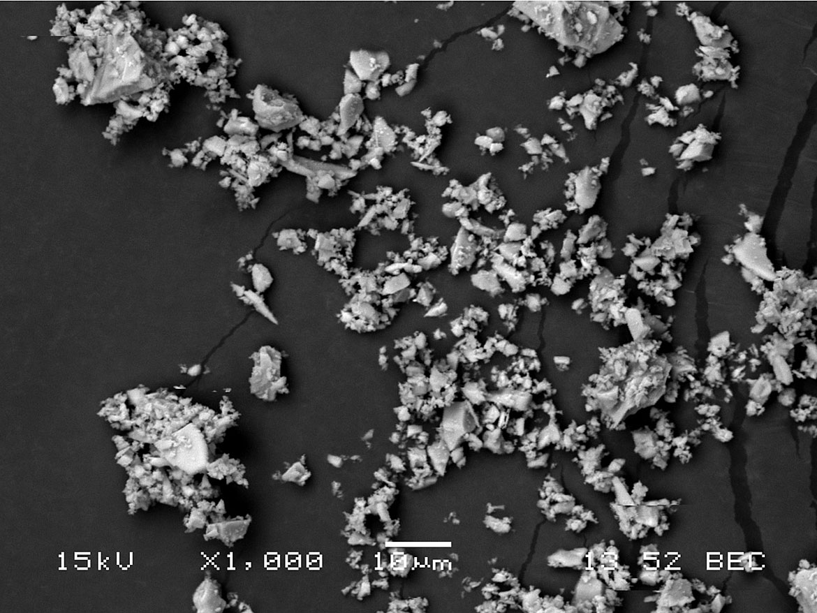 Scanning electron micrograph of nepheline syenite of 2.5 μm median particle size.