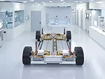 Electric car research and development with 3d rendering ev car with pack of battery cells module on platform in laboratory