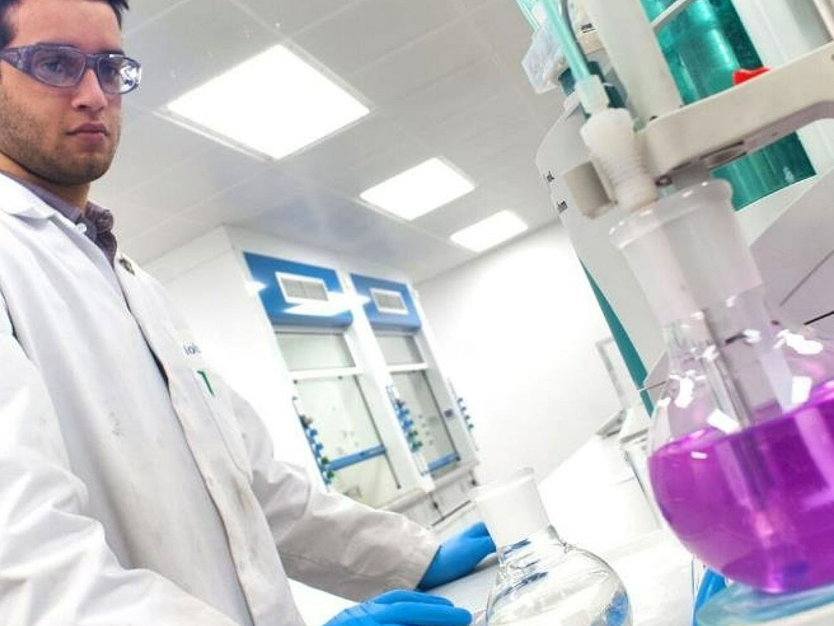 An AkzoNobel chemist working in the lab.