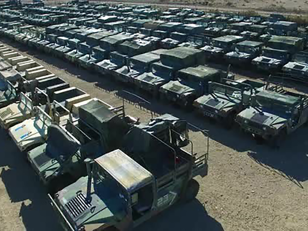 Ground vehicles undergoing repair and/or storage after use.