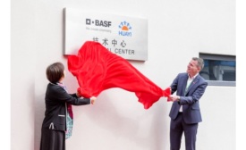 image of two people unveiling the new basf shanghai coatings technical center