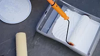 PCI1224-IndoramaReactiveSurfactants-1.jpg paint roller in tray with white paint