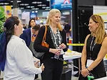 PCI Editor Kristin Johansson meets with Wacker Chemical Corp.'s Diane Merzbach (left) and Rachel Ufer (right). Photo courtesy of the AC Show Daily.