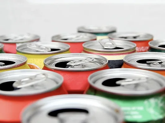 PCI-0524-VMR-feature-1170.png close up of open aluminum soda cans