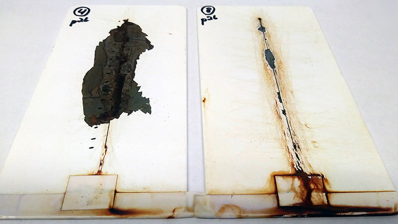 Salt fog results of traditional ZRP system vs. PPG PRIMERON system over iron phosphate-treated steel substrate.