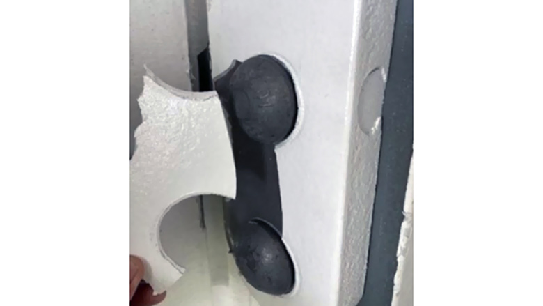 Brittle fracture of the intumescent PFP coating.