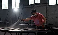 man woodworking in workshop