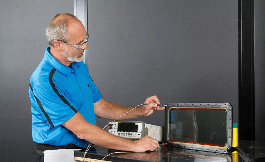 Boom operator compartment side window