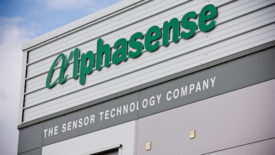 Photo of the Alphasense sign on a building