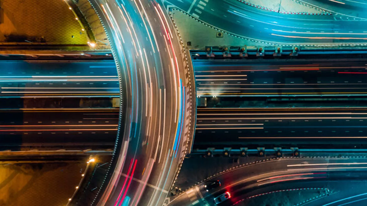 Aerial photo of freeway system at night