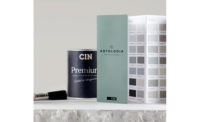 Photo of a can of CIN Premium paint and color chart