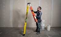 LEANSAFE X5 ladder from Werner Photo of man on LEANSAFE X5 ladder from Werner
