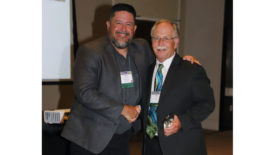 Photo of Bill Oney accepting the CCAI Lifetime Achievement award.