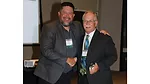 Photo of Bill Oney accepting the CCAI Lifetime Achievement award.