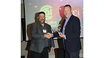 Photo of Bob Bonsall accepting the Twin Cities Chapter Award