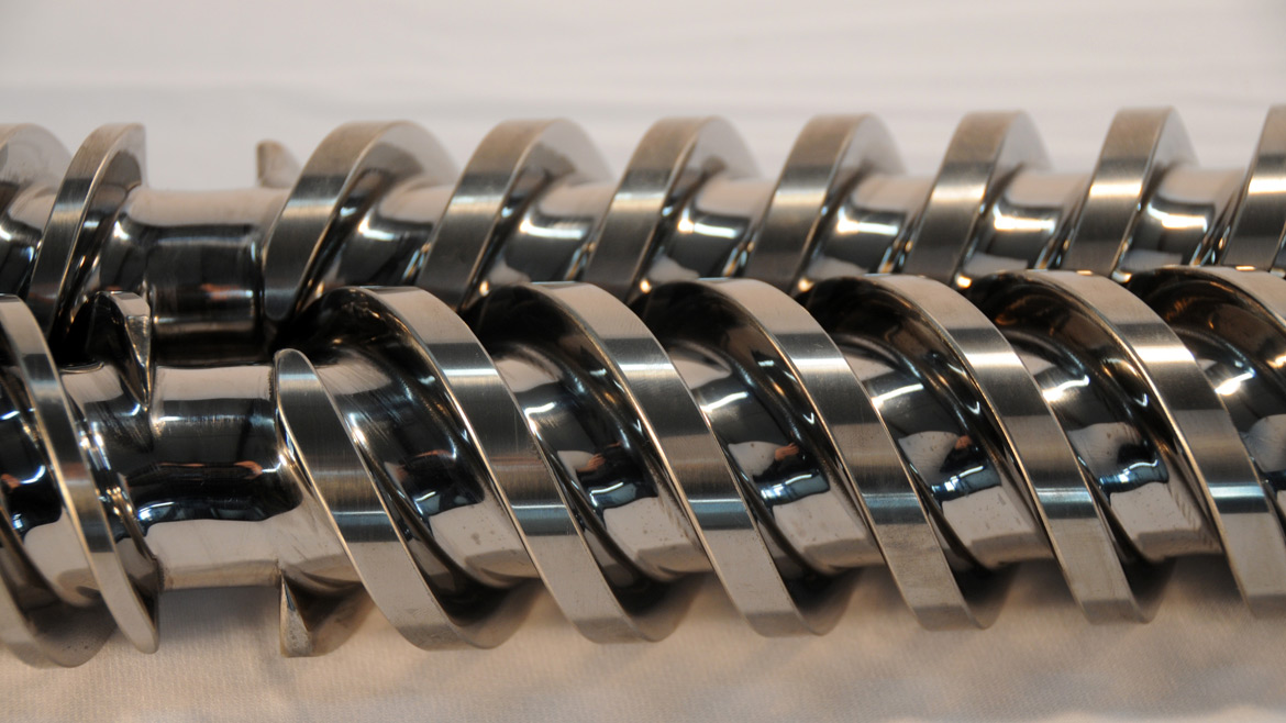 Photo of Twin Feed screws coated with Extreme Coatings product