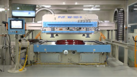 Image of the Ultra-Wide TOM Machine coating a car part
