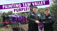 Photo of painters in front of the Taw Valley train