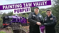 Photo of painters in front of the Taw Valley train