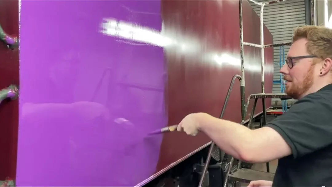 Photo of the painting of the Taw Valley from red to purple